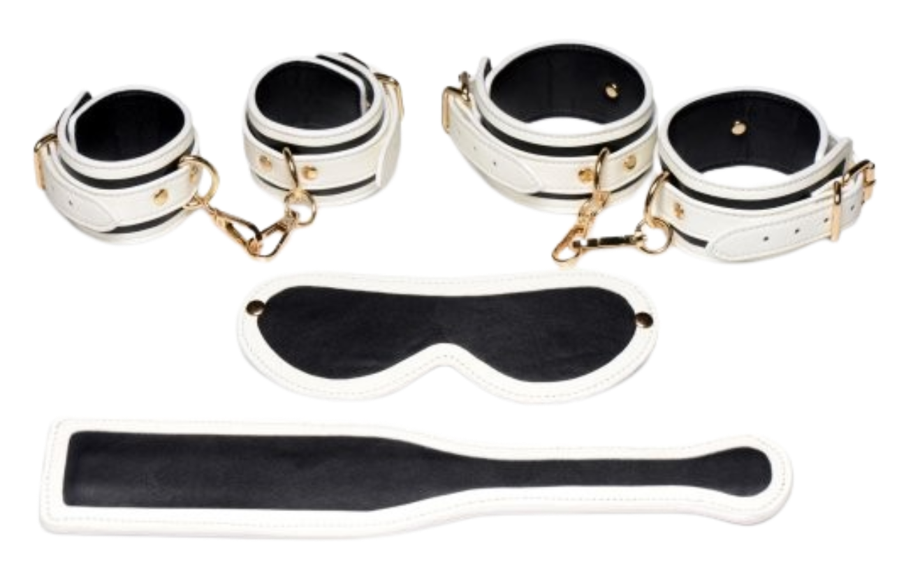Glowing cuffs, blindfold, and paddle bondage set