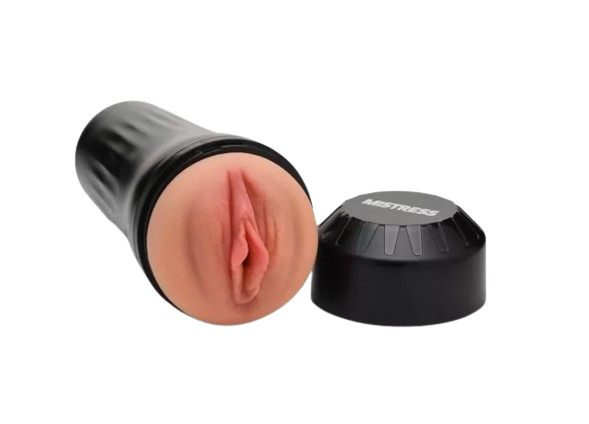 side tilt profile vibrating masturbator black and flesh color with black cap sex toy numen wellness