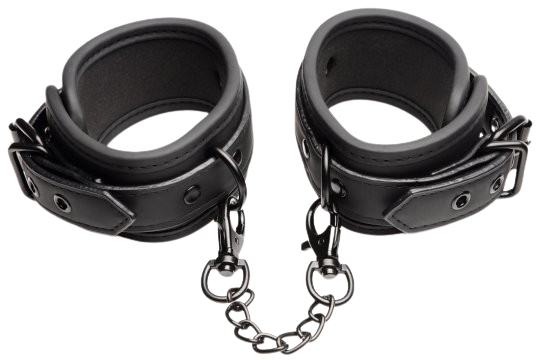 Close-up of black leather bondage cuffs with chain