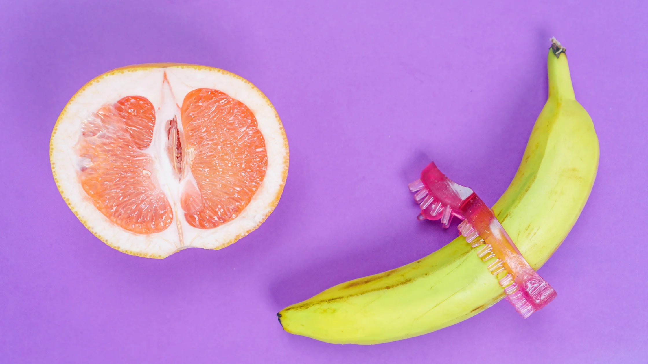 banana with cock ring on next to grapefruit numen wellness