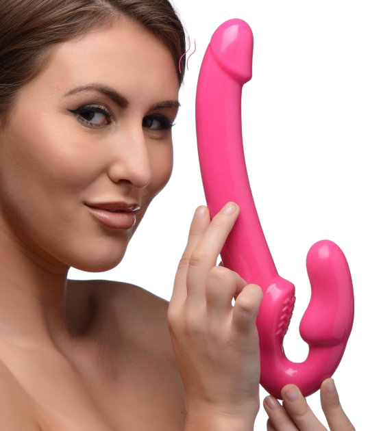 Pink Slim 8 inch Vibrating Strapless Strap-on women holding it with two hands sex toy numen wellness