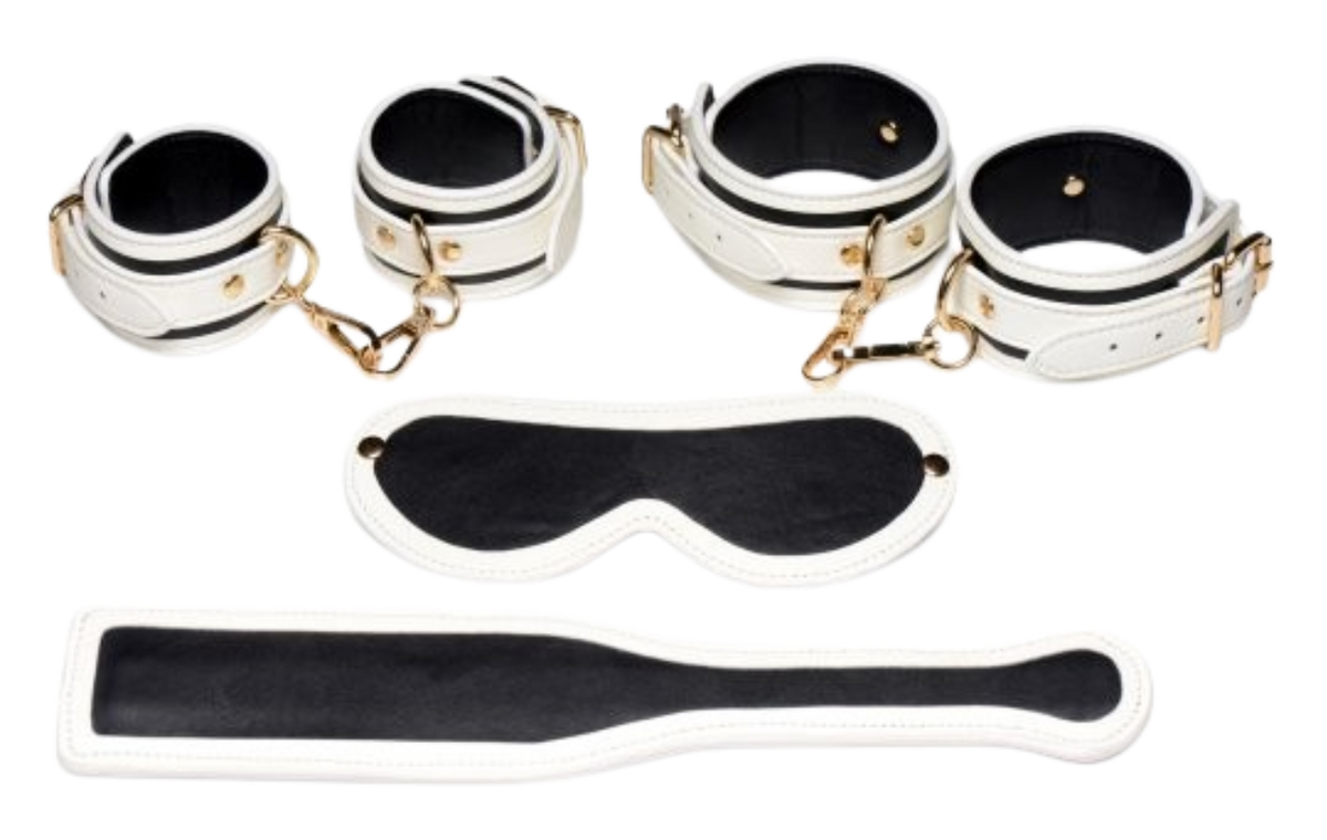 Glowing cuffs, blindfold, and paddle bondage set