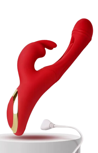 Red silicone rabbit vibrator charging on a white base