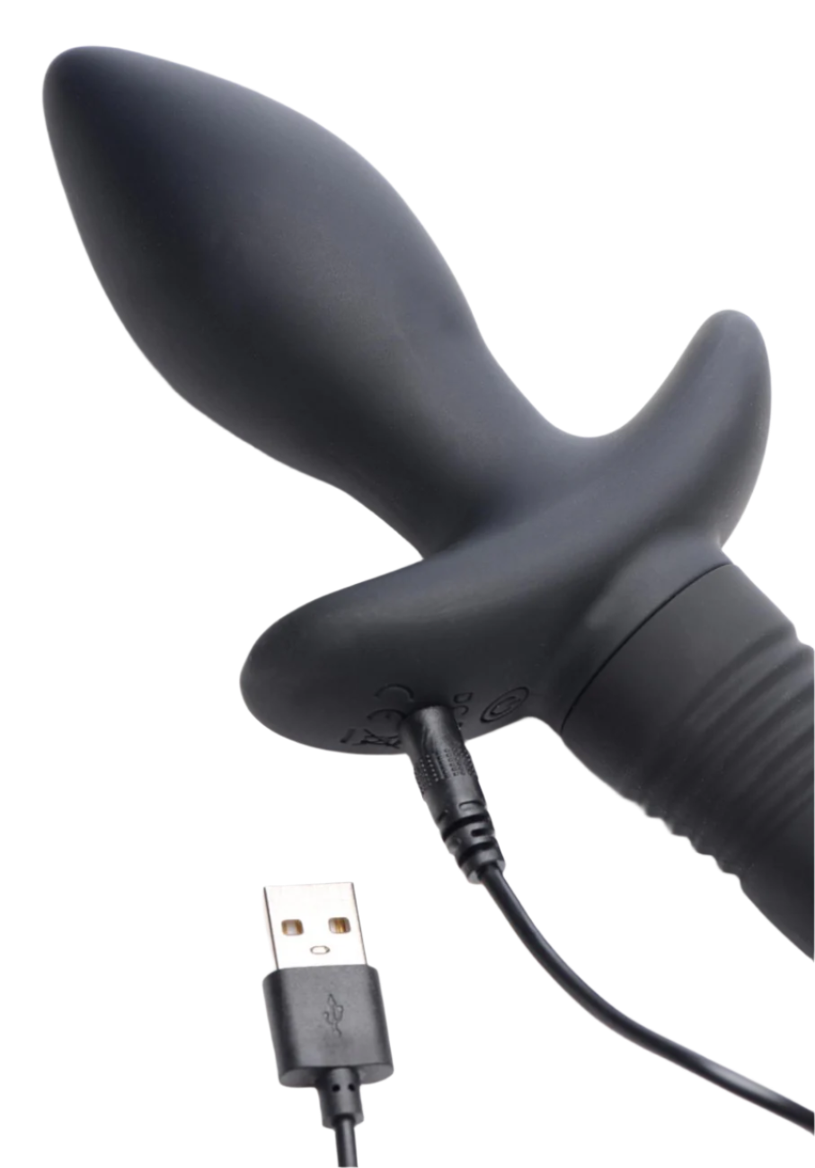 Remote control vibrators, black silicone puppy tail plug, angled view with USB Charger