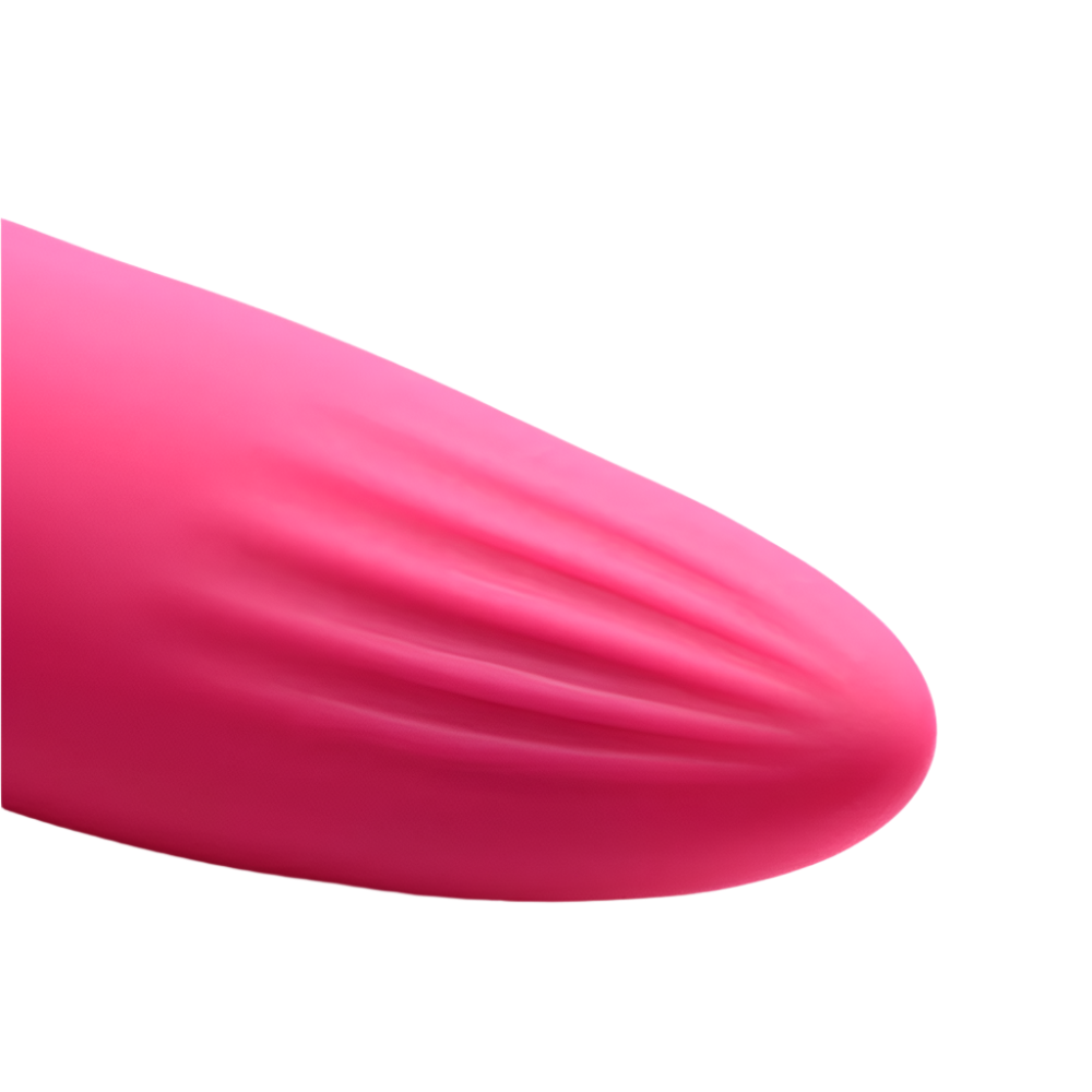 Vibrating pink silicone tongue vibrator, close-up of licking tip