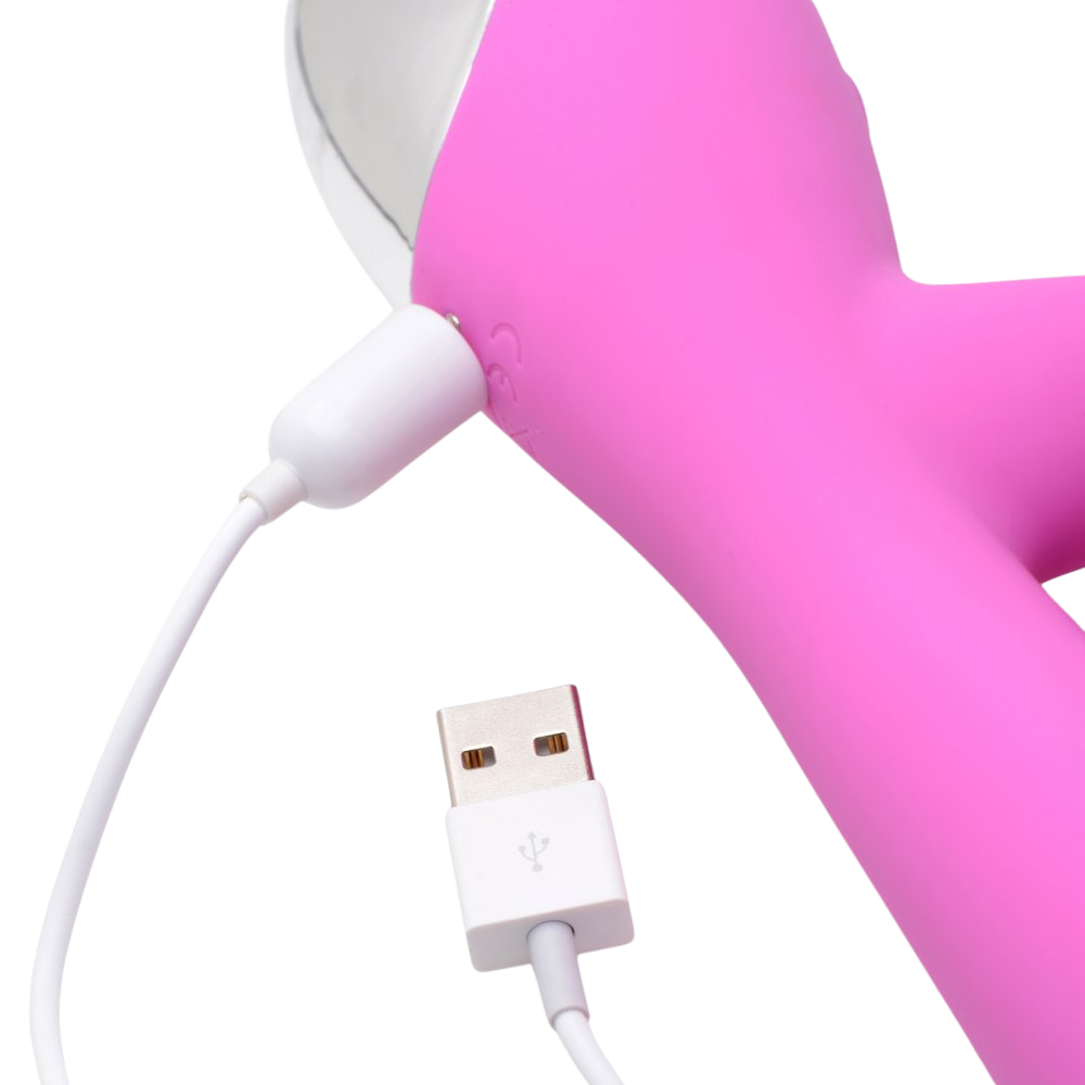 Suction Come-Hither Silicone Rabbit Vibrator with charging cable connected.